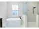 Relaxing bathroom with a freestanding soaking tub at 284 Corelli Dr, Nokomis, FL 34275