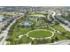 Aerial view of community park with tennis courts and playground at 11410 Griffith Park Ter, Bradenton, FL 34211