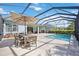 Relaxing pool and patio with outdoor dining at 11410 Griffith Park Ter, Bradenton, FL 34211