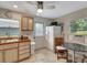 Kitchen with stainless steel appliances and wood cabinets at 4020 School S Ave, Sarasota, FL 34231