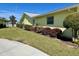 Exterior view of house with landscaping at 6812 11Th W Ave # 6812, Bradenton, FL 34209