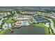 Aerial view of community with tennis courts, pool, clubhouse, and lake at 6912 Gosport Cv, Lakewood Ranch, FL 34202