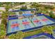 Expansive pickleball courts with many players enjoying the game at 6912 Gosport Cv, Lakewood Ranch, FL 34202