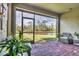 Enjoy the view from this screened porch at 6912 Gosport Cv, Lakewood Ranch, FL 34202