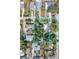 Aerial view of three adjacent lots with existing structures, offering development potential at 2132 Roselawn St, Sarasota, FL 34231