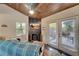 Open living area with French doors opening to the backyard at 2132 Roselawn St, Sarasota, FL 34231