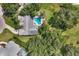 Aerial view showcasing house and pool at 6414 Glen Abbey Ln, Bradenton, FL 34202