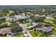 Aerial view of upscale neighborhood with lake at 6414 Glen Abbey Ln, Bradenton, FL 34202