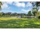 Serene pond view with lush greenery at 6414 Glen Abbey Ln, Bradenton, FL 34202