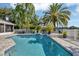 Stunning pool with patio and tropical landscaping at 6414 Glen Abbey Ln, Bradenton, FL 34202