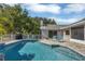 Inviting pool area with patio and lounge chairs at 6414 Glen Abbey Ln, Bradenton, FL 34202