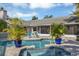 Inviting pool and spa with surrounding patio at 6414 Glen Abbey Ln, Bradenton, FL 34202