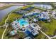 Aerial view of community amenities including pool, clubhouse, and courts at 17745 Lucaya Dr, Lakewood Ranch, FL 34202