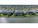 Aerial view of upscale homes situated along a peaceful lake at 17745 Lucaya Dr, Lakewood Ranch, FL 34202