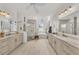 Spa-like bathroom with double vanity, soaking tub, and walk-in shower at 17745 Lucaya Dr, Lakewood Ranch, FL 34202