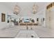 Large kitchen island with white sink and breakfast bar at 17745 Lucaya Dr, Lakewood Ranch, FL 34202