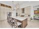 Open concept kitchen with stainless steel appliances and large island at 17745 Lucaya Dr, Lakewood Ranch, FL 34202