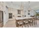 Gourmet kitchen boasts modern appliances and a large island with seating at 17745 Lucaya Dr, Lakewood Ranch, FL 34202