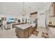 Open kitchen features a large island and breakfast bar at 17745 Lucaya Dr, Lakewood Ranch, FL 34202