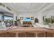 Open living room with a large sectional sofa and pool view at 17745 Lucaya Dr, Lakewood Ranch, FL 34202