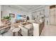 Open living area with a large sectional and views to the pool and kitchen at 17745 Lucaya Dr, Lakewood Ranch, FL 34202