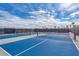 Two pickleball courts with bright blue surfaces at 17745 Lucaya Dr, Lakewood Ranch, FL 34202