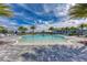 Large resort-style pool with fountains and lounge area at 17745 Lucaya Dr, Lakewood Ranch, FL 34202