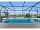 Inviting screened pool with a fountain and a tranquil lake view at 17745 Lucaya Dr, Lakewood Ranch, FL 34202