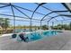 Enjoy this refreshing screened pool with a relaxing lake view at 17745 Lucaya Dr, Lakewood Ranch, FL 34202