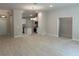 Spacious open-concept living area flows into a well-appointed kitchen with modern appliances at 5661 Gaffney Rd, North Port, FL 34286