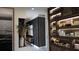 Modern entryway with stylish decor and a unique wall at 3118 Tramonto Ct, Bradenton, FL 34211