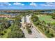 Gated community entrance with landscaping at 323 Winding Brook Ln # 102, Bradenton, FL 34212