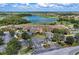 Community clubhouse with pool and parking at 323 Winding Brook Ln # 102, Bradenton, FL 34212