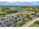 Community clubhouse with pool, tennis courts, and parking at 323 Winding Brook Ln # 102, Bradenton, FL 34212