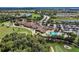 Community clubhouse with pool and golf course views at 323 Winding Brook Ln # 102, Bradenton, FL 34212