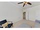 Spacious bedroom with door to hallway and bath at 323 Winding Brook Ln # 102, Bradenton, FL 34212