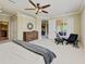 Main bedroom with king bed and access to balcony at 323 Winding Brook Ln # 102, Bradenton, FL 34212