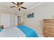 Guest bedroom with full bed and access to laundry at 323 Winding Brook Ln # 102, Bradenton, FL 34212