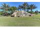 River Strand community entrance with waterfall feature at 323 Winding Brook Ln # 102, Bradenton, FL 34212