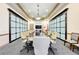 Large conference room with a long table at 323 Winding Brook Ln # 102, Bradenton, FL 34212