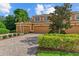 Condo building with attached garages and landscaping at 323 Winding Brook Ln # 102, Bradenton, FL 34212
