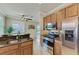 Updated kitchen with stainless steel appliances and granite counters at 323 Winding Brook Ln # 102, Bradenton, FL 34212