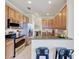 Modern kitchen with stainless steel appliances and granite countertops at 323 Winding Brook Ln # 102, Bradenton, FL 34212