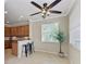Bright kitchen featuring stainless steel appliances and wood cabinets at 323 Winding Brook Ln # 102, Bradenton, FL 34212
