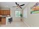 Modern kitchen with stainless steel appliances and wood cabinets at 323 Winding Brook Ln # 102, Bradenton, FL 34212
