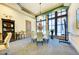 Small meeting room with a table and chairs at 323 Winding Brook Ln # 102, Bradenton, FL 34212