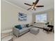Bright office with sofa, chair, and large window at 323 Winding Brook Ln # 102, Bradenton, FL 34212