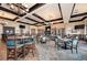 Bright dining room with multiple tables and chairs at 323 Winding Brook Ln # 102, Bradenton, FL 34212
