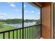 Peaceful screened balcony with lake view at 323 Winding Brook Ln # 102, Bradenton, FL 34212