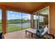 Serene screened balcony overlooking lake at 323 Winding Brook Ln # 102, Bradenton, FL 34212